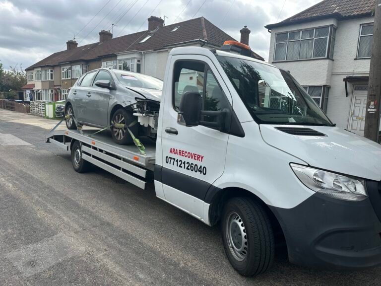 Damaged car transported on an ARA Recovery truck